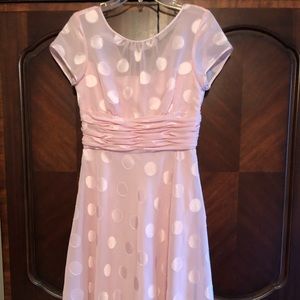A pink dotted dress
